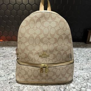 Coach Signature Monogram backpack